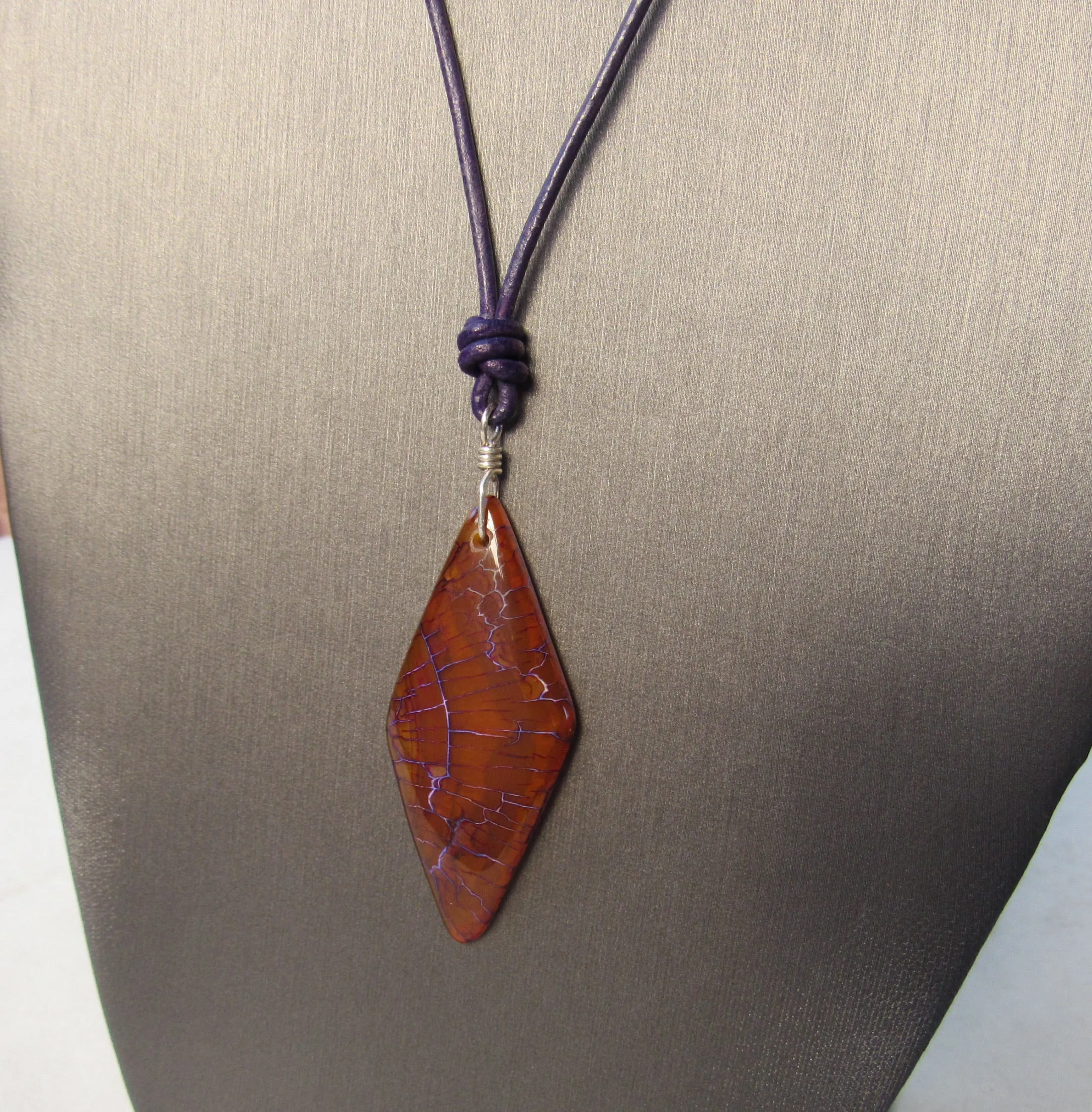 Dragon’s Vein Agate gemstone, Sterling Silver, and Leather