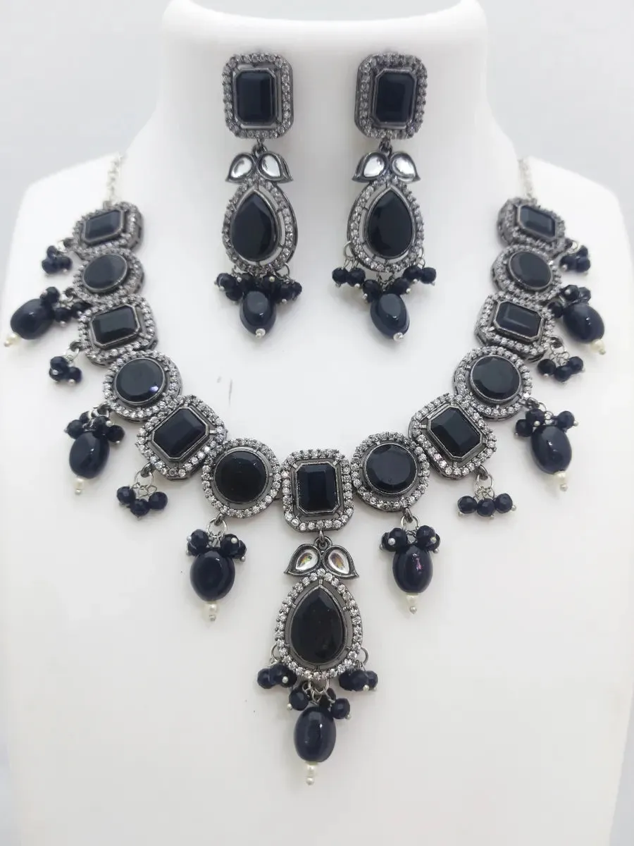 Mesmerizing Zircon Stone Ornamented Traditional Silver And Black Color Alloy Necklace Set