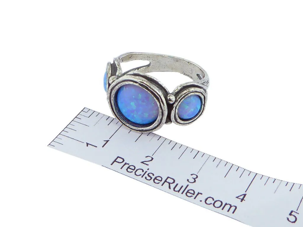 opal rings for women Bluenoemi sterling silver ring for woman. Set with a blue lab opal stone.