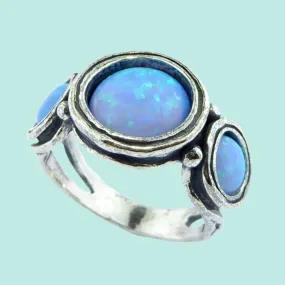 opal rings for women Bluenoemi sterling silver ring for woman. Set with a blue lab opal stone.